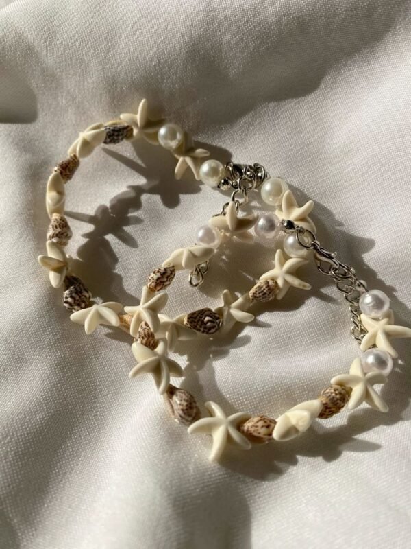 a bracelets with shells and pearls