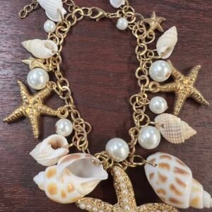 a bracelet with seashells and starfishes