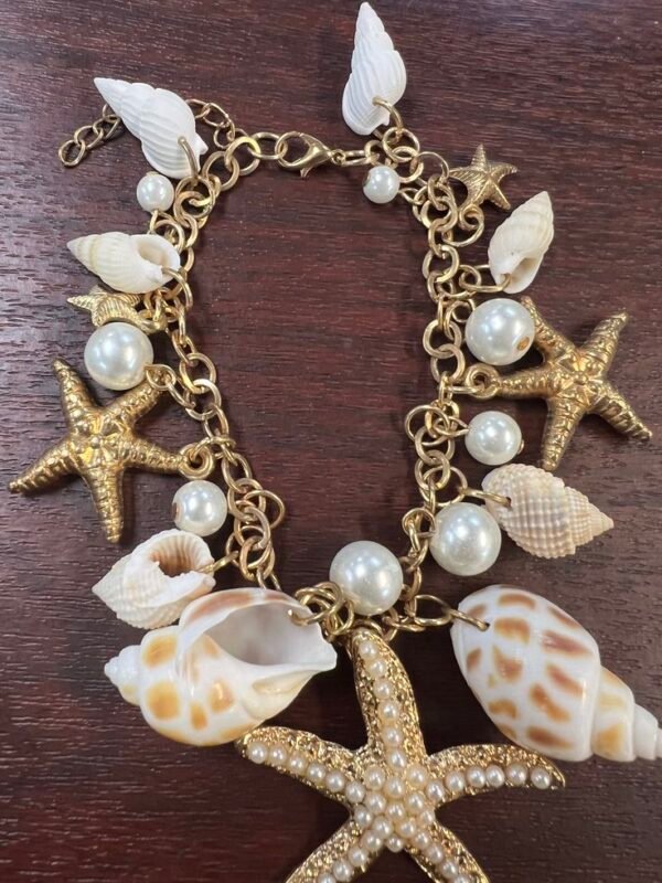 a bracelet with seashells and starfishes