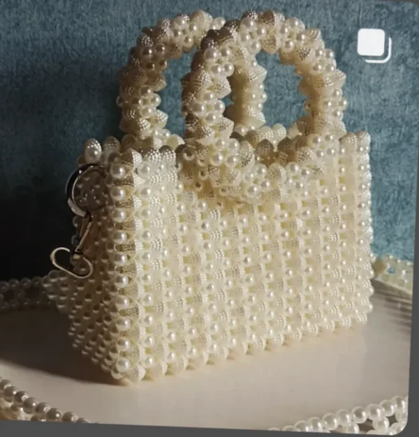 ⁦شنطه خرز لولي وفتافيت⁩ - الصورة ⁦2⁩